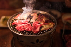 Grilling wagyu beef on charcoal grill